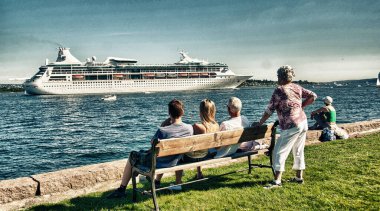 OSLO - JUN 9: Cruise Ship leaves the city on June 9, 2010 in Oslo. Norway capital is one of the major european  destination.