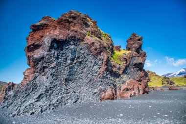 Rock formations in Djupalonssandur beach, Iceland.