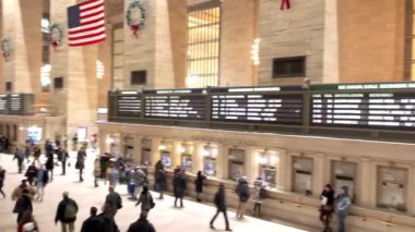 NEW YORK CITY - DECEMBER 4, 2018: Grand Central Main Terminal with tourists and locals. The city attracts 50 million people annually.