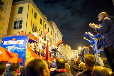PISA, ITALY - JUNE 15TH, 2016: Celebrations on the night for the soccer team's promotion. People mad with joy in the street.