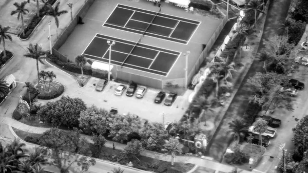 Tennis courts aerial view from helicopter