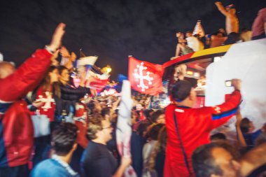 PISA, ITALY - JUNE 15TH, 2016: Local fans celebrate the soccer team's promotion. Celebrations in the night.