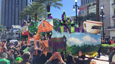 New Orleans, LA - February 9, 2016: Mardi Gras floats parade through the streets of New Orleans.People celebrated crazily. Mardi Gras is the biggest celebration the city of New Orleans hosts every year.