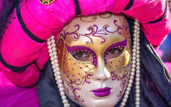 Venice, Italy - February 8th, 2015: People masquerading at the famous Venice Carnival.