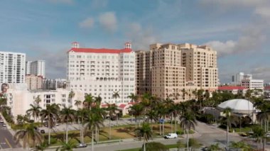 WEST PALM BEACH, FL - APRIL 10, 2018: City skyline aerial view from lake on a wonderful sunny day. The city is a major attraction in Florida.