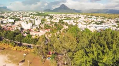 Aerial view of mountains and river from Flic en Flac Beach, Mauritius Island.