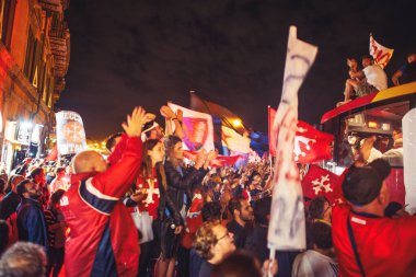 PISA, ITALY - JUNE 15TH, 2016: Celebrations on the night for the soccer team's promotion. People mad with joy in the street.