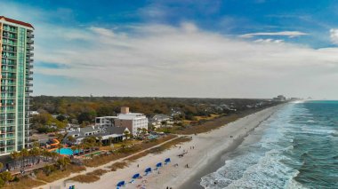 Myrtle Beach from drone, South Carolina. City and beach view at dusk.