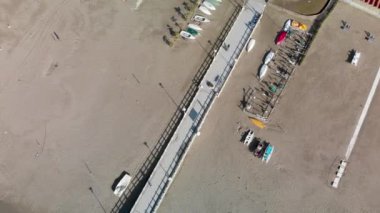 Overhead view of Forte Dei Marmi pier on a sunny day.