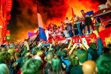 PISA, ITALY - JUNE 15TH, 2016: Celebrations on the night for the soccer team's promotion. People mad with joy in the street.