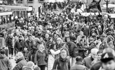 Venice, Italy - February 8, 2015: Crowd along St Mark Square during the carnival parade.