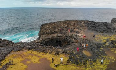 Pont Naturel, Mauritius Island. Beautiful arch rock formation from a drone viewpoint.