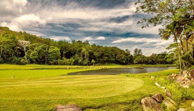 Golf course on a beautiful tropical beach.