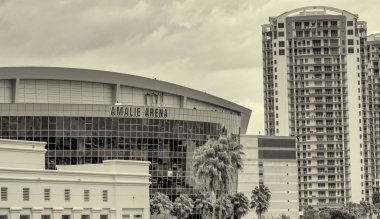 Tampa, FL - February 6, 2016: Amalie Arena and city skyline on a cloudy day.