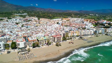 Estepona, Andalusia. Beautiful aerial view of cityscape along the coast in the morning. clipart