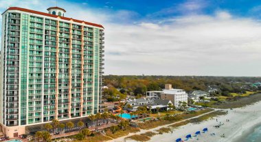 Myrtle Beach from drone, South Carolina. City and beach view at dusk.