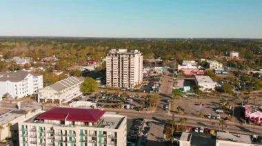 Aerial view of Myrtle Beach, South Carolina. Buildings and beach at sunset.