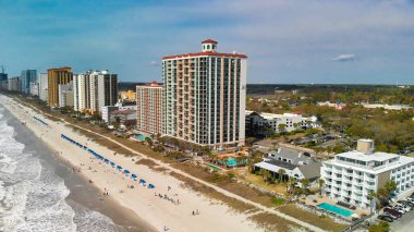 Aerial view of Myrtle Beach, South Carolina. Buildings and beach at sunset.