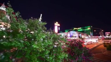 LAS VEGAS, NV - JUNE 30, 2018: Night view of The Strip from city escalator. Las Vegas is the world gambling capital.
