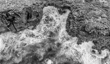 Pont Naturel, Mauritius Island. Beautiful arch rock formation from a drone viewpoint.