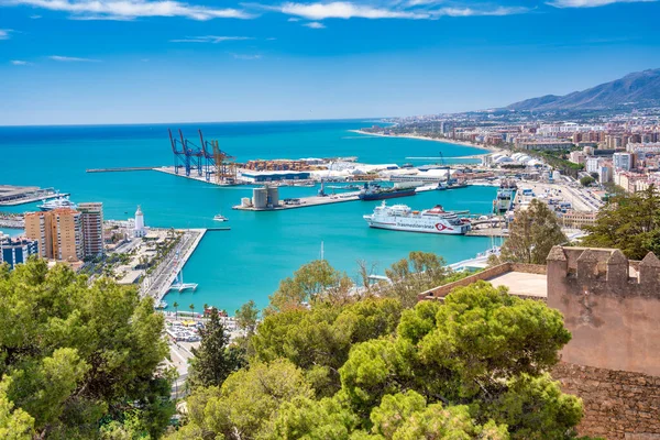 stock image Malaga, Spain - April 14, 2023: Aerial view of Malaga port and city skyline from Gibralfaro Castle.