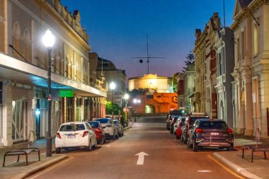 Fremantle, Australia - September 10, 2023: City streets and buildings at sunset, clipart