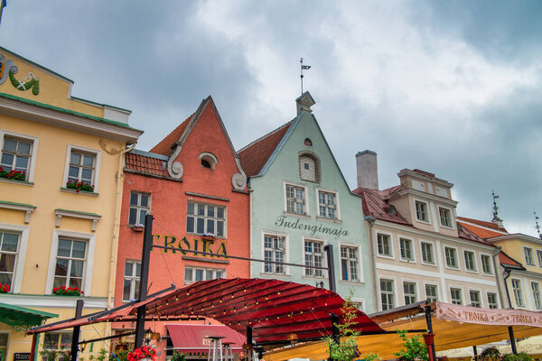 Tallinn, Estonia - July 2, 2017: Streets and buildings of Tallinn on a cloudy summer day.