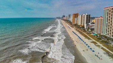 Aerial view of Myrtle Beach, South Carolina. Buildings and beach at sunset.