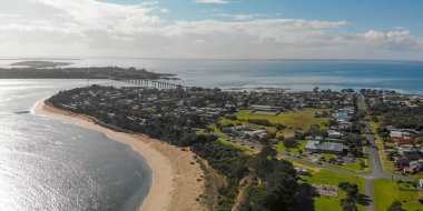 Aerial view of Phillip Island coastline at sunset, Australia.