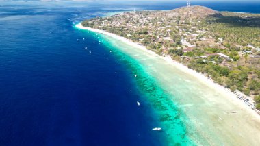 Amazing aerial view of Gili Trawangan coastline on a sunny day, Indonesia. clipart