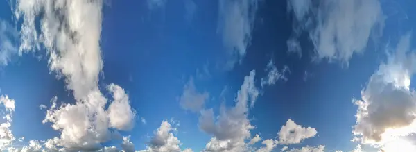 Panoramic 360 degrees aerial view of morning sky with clouds.