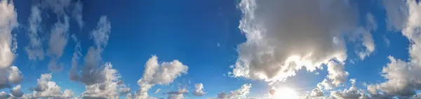Panoramic 360 degrees aerial view of morning sky with clouds.