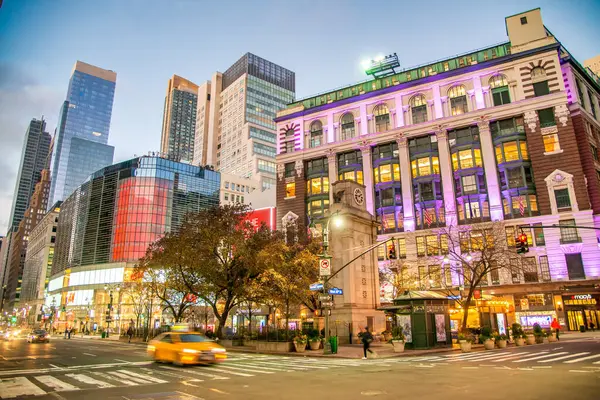 New York City, NY - December 1st, 2018: Night traffic around Herald Square in Manhattan.