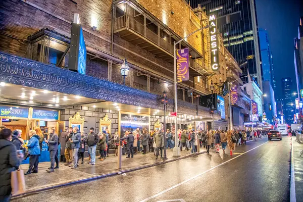 stock image New York City - December 1, 2018: Tourists on line in front of Midtown Manhattan Theater.