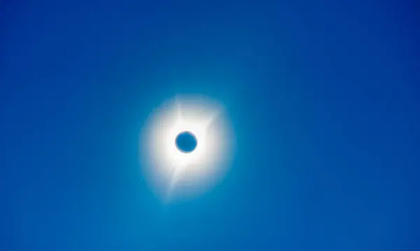 Total Solar Eclipse, sun covered by the moon in the sky.