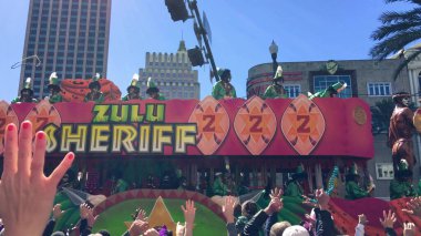 New Orleans, LA - February 9, 2016: Mardi Gras floats parade through the streets of New Orleans.People celebrated crazily. Mardi Gras is the biggest celebration the city of New Orleans hosts every year.