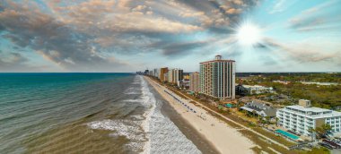 Myrtle Beach from drone, South Carolina. City and beach view at dusk.