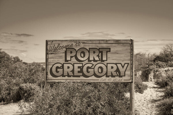 Port Gregory road sign along the Pink Lake, Western Australia.