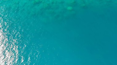 Overhead aerial view of beautiful ocean water.