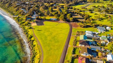 Emu Bay homes and coastline, Kangaroo Island from drone, Australia.