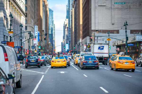 New York City - December 1, 2018: Taxi yellow cabs in Times Square.