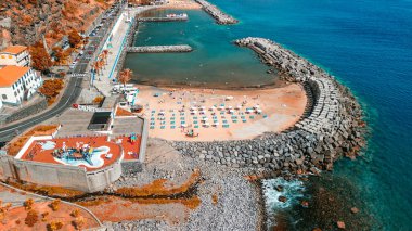 Aerial view of Calheta Beach in Madeira.