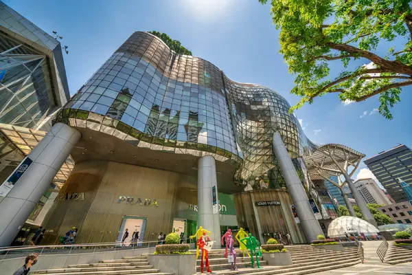 Stock image Singapore - September 14, 2023: Modern buildings along Orchard Road on a sunny day.