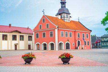 Bauska,City square and buildings on a cloudy afternoon, Latvia. clipart