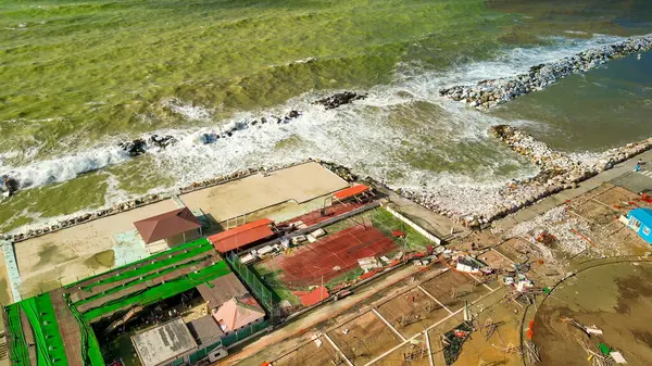 stock image Storm in Marina di Pisa, Tuscany. Fury of the waves on the coast, aerial view on a sunny morning.