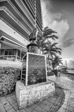 Lady of Miami Statue along Miami Riverwalk at sunset, Florida.