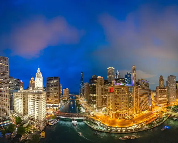 stock image Panoramic aerial view of Chicago skyline along Chicago River on a summer night - Illinois