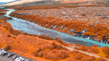 Aerial view of Beautiful blue river and rock formations at Barnafoss waterfalls in Western Iceland. clipart