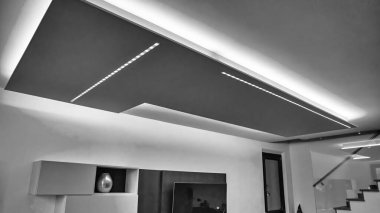 LED Strip Lighting Installation for a Bright and Modern Basement Renovation. clipart