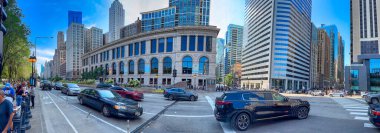 Chicago, IL - July 27, 2024: Tourists and locals along Michigan Avenue on a beautiful summer day. Panoramic view. clipart